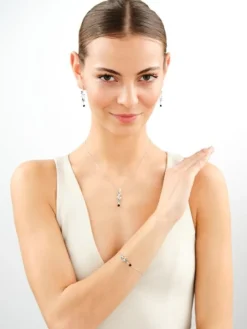 Bransoletka srebrna z cyrkoniami i  szlifowanym szkłem - motyl