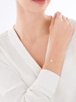 Bransoletka srebrna ze szkłem - stópki, chłopiec