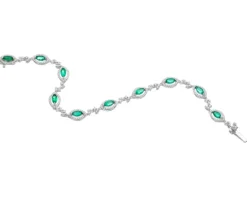 Bransoletka z białego złota z brylantami i szmaragdami - 18 cm - próba 585