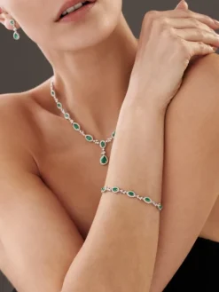 Bransoletka z białego złota z brylantami i szmaragdami - 19 cm - próba 585