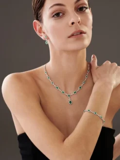 Bransoletka z białego złota z brylantami i szmaragdami - 19 cm - próba 585