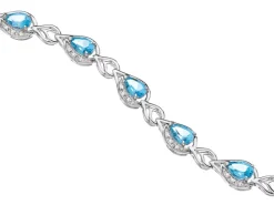 Bransoletka z białego złota z diamentami i topazami - 18 cm - próba 375