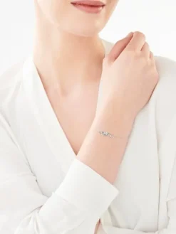 Bransoletka z białego złota z diamentami i topazami - liść - próba 375