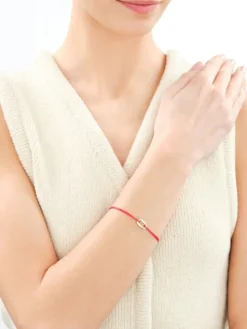 Bransoletka z cyrkoniami i elementami z żółtego złota