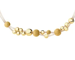 Bransoletka z cyrkoniami i elementami z żółtego złota - kulki