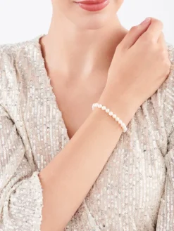 Bransoletka z elementami żółtego złota - perły