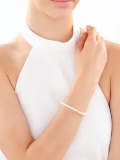 Bransoletka z elementami z żółtego złota - perły