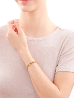 Bransoletka z elementami z żółtego złota i koralikami