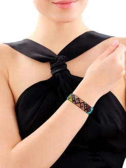 Bransoletka z elementami z żółtego złota i koralikami