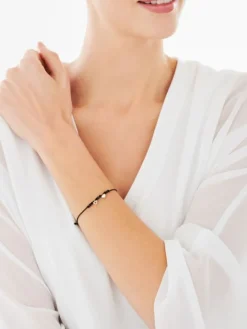 Bransoletka z elementami srebra - litera M, koniczyna