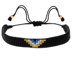 Bransoletka z elementami z żółtego złota i koralikami