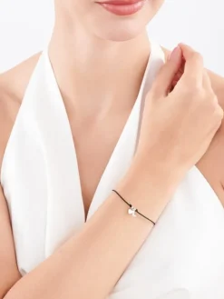 Bransoletka z elementami srebra - litera L, serce