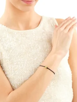 Bransoletka z elementami żółtego złota z diamentem i kamieniami ozdobnymi - koniczyna, serca - próba 375