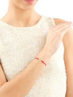 Bransoletka z elementami żółtego złota i diamentem - aniołek, serce - 0,003 ct - próba 375