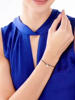 Bransoletka z elementami srebra - litera K, koniczyna