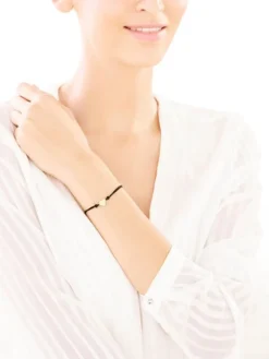 Bransoletka z elementami żółtego złota i brylantem - serce - 0,008 ct - próba 375