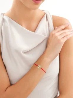 Bransoletka z elementami z żółtego złota - rozeta