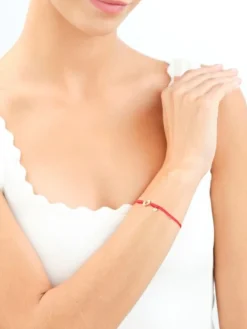 Bransoletka z elementami żółtego złota i diamentem - serca - 0,003 ct - próba 375