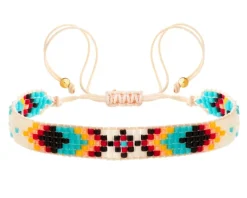 Bransoletka z elementami z żółtego złota i koralikami