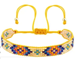 Bransoletka z elementami z żółtego złota i koralikami