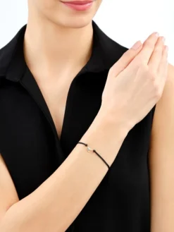 Bransoletka z elementami żółtego złota, diamentami i topazem London Blue - koliber - próba 375