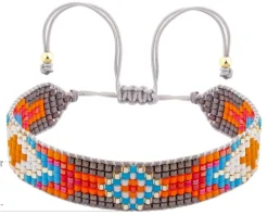 Bransoletka z elementami z żółtego złota i koralikami