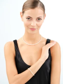 Bransoletka z elementami z żółtego złota - perły