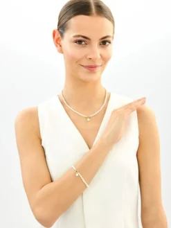 Bransoletka z elementami z żółtego złota - perły