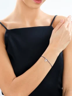 Bransoletka z elementami srebra - samolot, kula ziemska