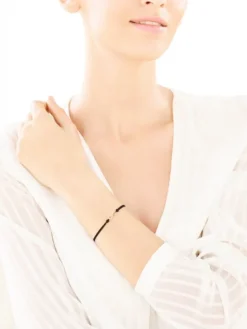 Bransoletka z elementami żółtego złota i diamentem - nieskończoność - 0,004 ct - próba 375