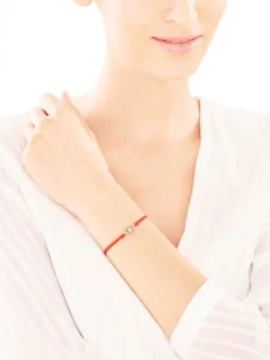 Bransoletka z elementami żółtego złota i brylantem - serce - 0,008 ct - próba 375