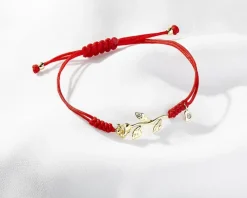 Bransoletka z elementami żółtego złota i diamentem - róża, serce - 0,005 ct - próba 375