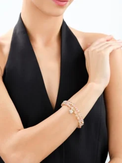 Bransoletka z mosiądzu pozłacana z kamieniami księżycowymi, szklanymi detalami i cyrkoniami - koniczyna