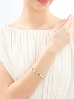 Bransoletka z mosiądzu pozłacana z hematytami i szklanymi detalami