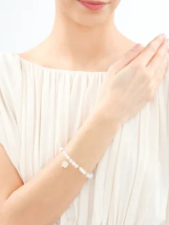 Bransoletka z mosiądzu pozłacana z kwarcami, cyrkoniami i szklanymi detalami - koniczyna