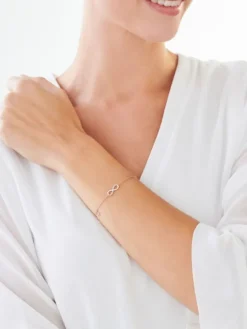 Bransoletka z różowego i białego złota z diamentami - nieskończoność i serce - 0,01 ct - próba 375