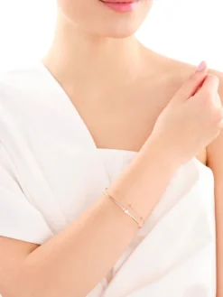 Bransoletka z żółtego i białego złota z brylantami - 0,03 ct - próba 375