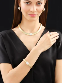 Bransoletka z żółtego i białego złota z brylantami - 0,68 ct - próba 750