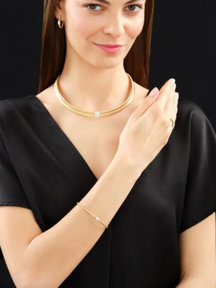 Bransoletka z żółtego i białego złota z brylantami - 0,13 ct - próba 750