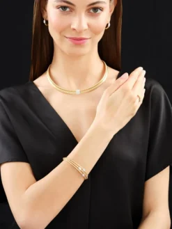 Bransoletka z żółtego i białego złota z brylantami - 0,38 ct - próba 750