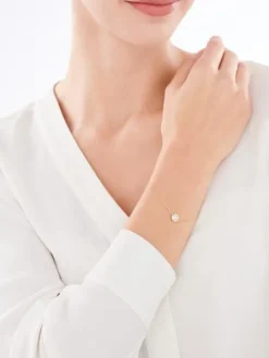 Bransoletka z żółtego i białego złota z brylantem - 0,02 ct - próba 375