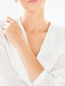 Bransoletka z żółtego złota z diamentami - nieskończoność, serce - 0,01 ct - próba 375