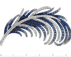 Broszka z białego złota z brylantami i szafirami cejlońskimi - piórko - próba 750