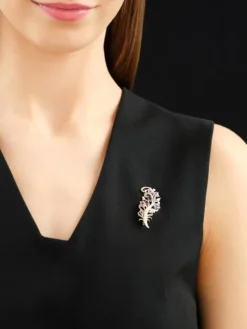 Broszka z żółtego złota z brylantami, kamieniami szlachetnymi i ozdobnymi - piórko - próba 585