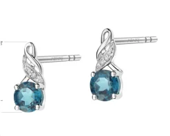 Kolczyki z białego złota z diamentami i topazami London Blue - próba 585