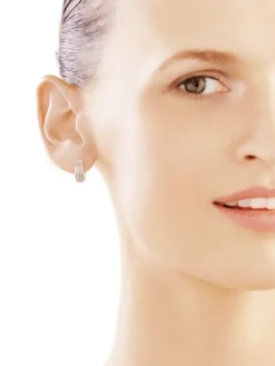 Kolczyki z białego złota z diamentami - koła - 0,14 ct - próba 585