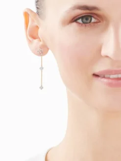 Kolczyki z żółtego i białego złota z brylantami - kwiaty lotosu - 0,10 ct - próba 375