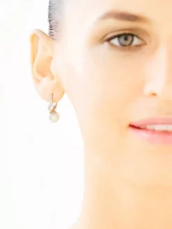 Kolczyki z żółtego złota z diamentami  i perłami - próba 585