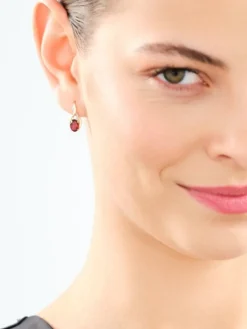 Kolczyki z żółtego złota z diamentami i granatami - próba 585