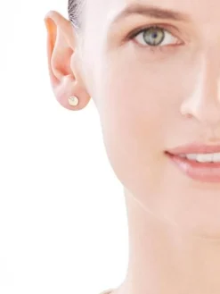 Kolczyki z żółtego złota z diamentami - koła - 0,01 ct - próba 375